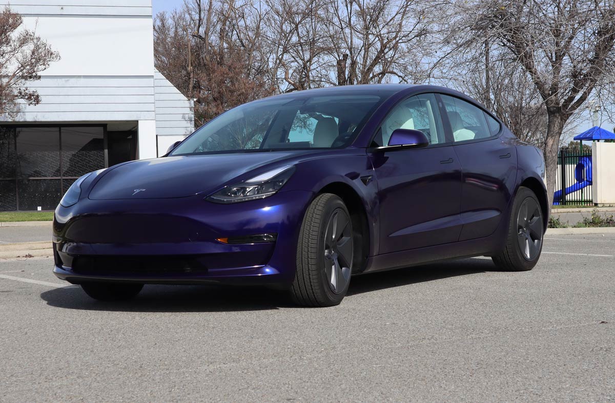 Tesla Model 3 Full Vehicle Vinyl Wrap Color Change to Avery Gloss Roaring Thunder with Ceramic Coating